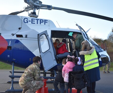 Children waiting to get into the helicopter (1)